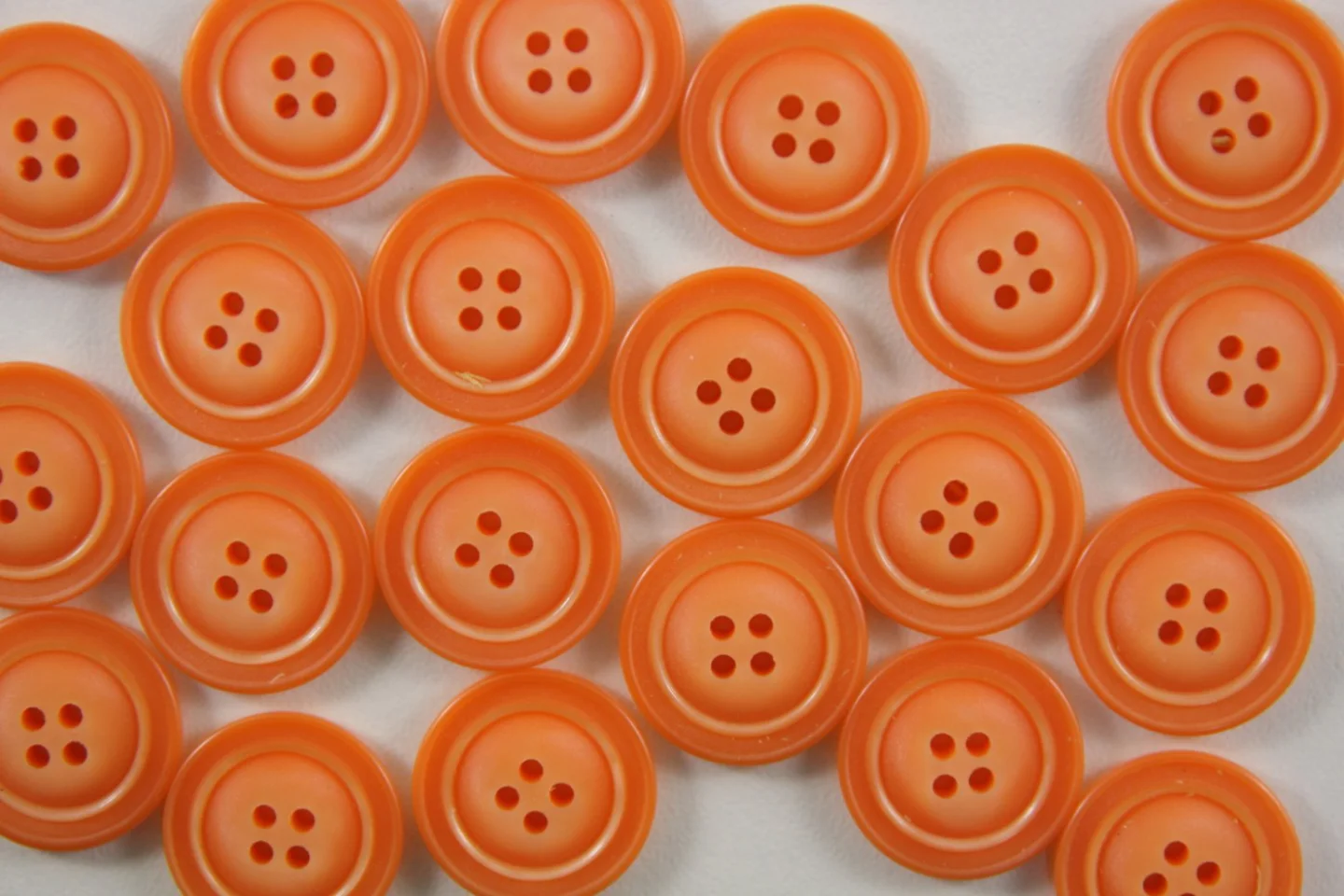 Oranje knoop dubbele rand-18mm.