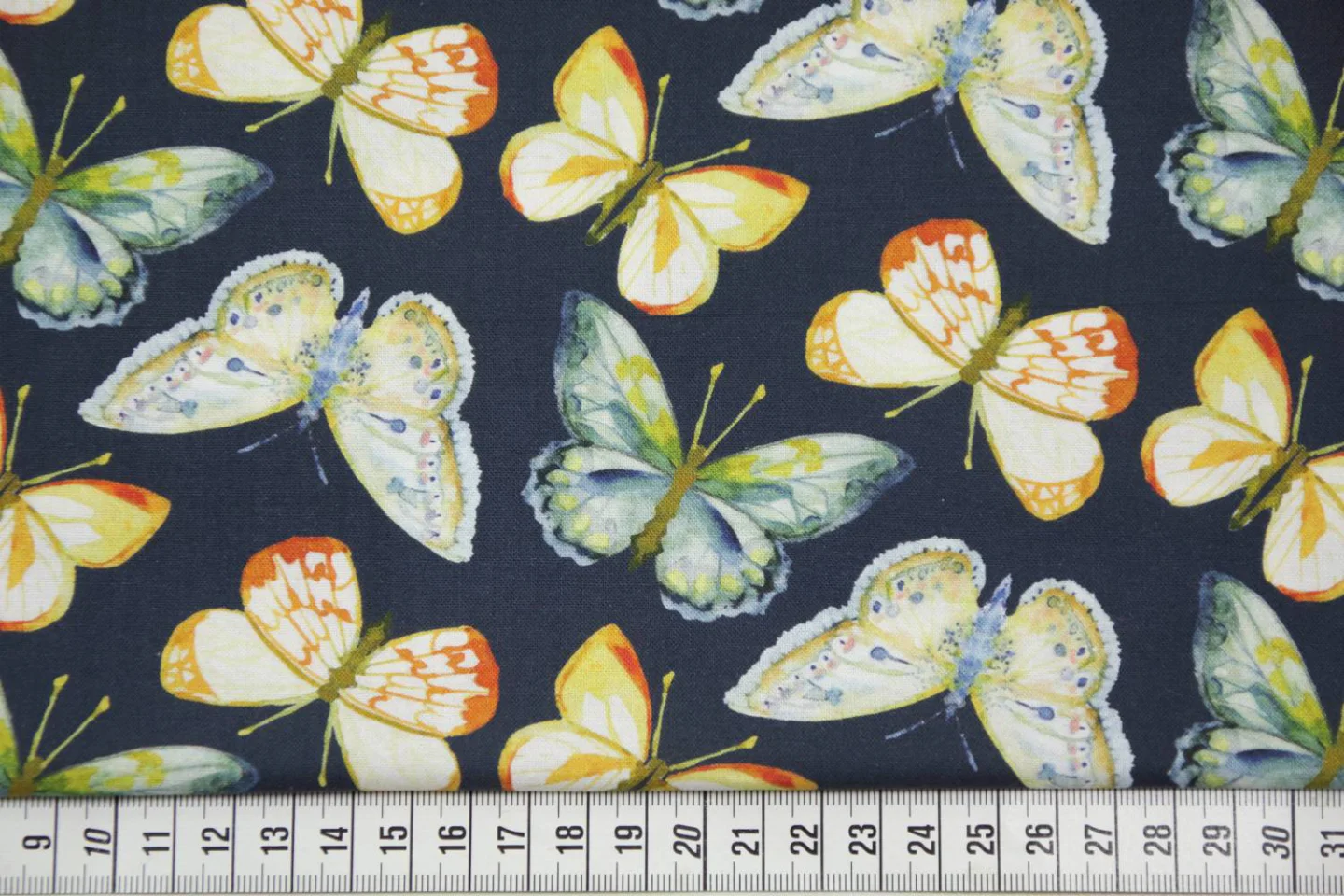quiltstof-donkerblauw met vlinders in mu.
