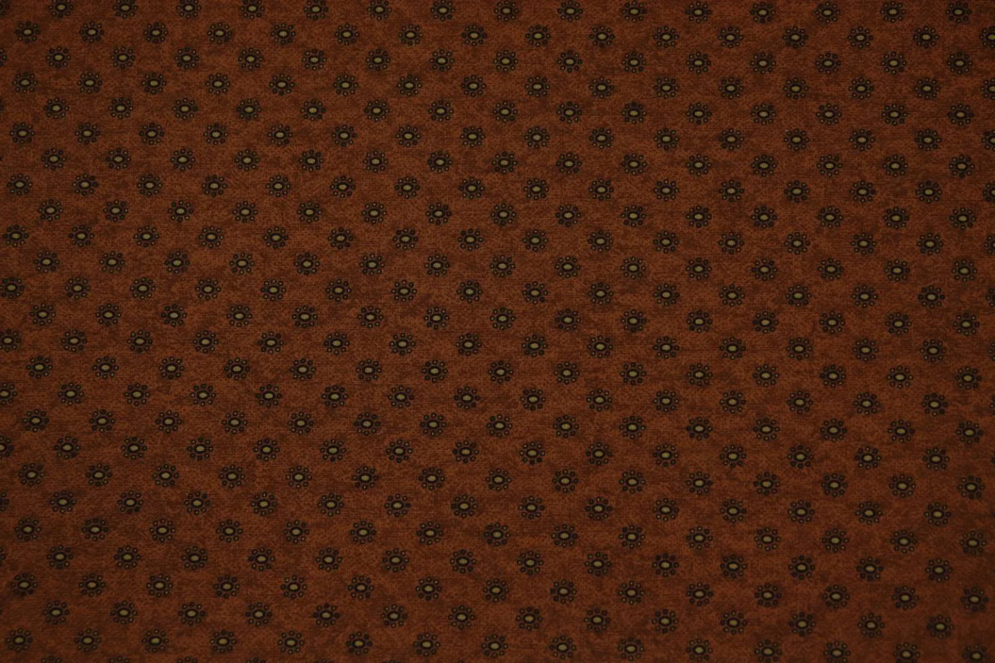 quiltstof-roest-stipjes bloem-Marcus -Ma.