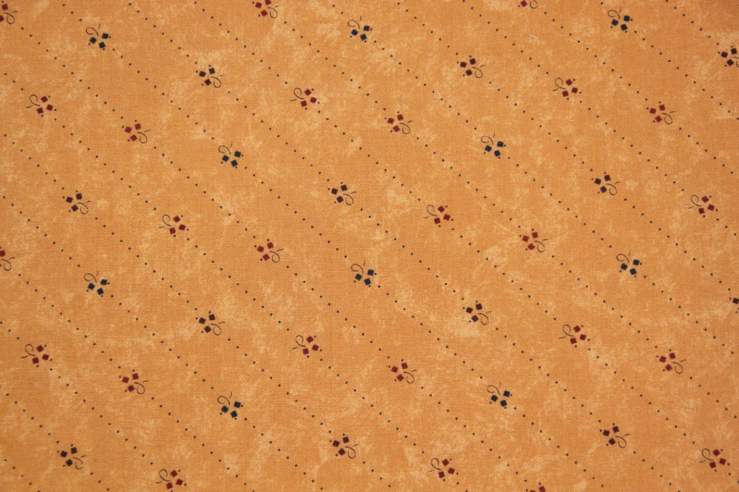 quiltstof-terracotta, diagonale stippell.