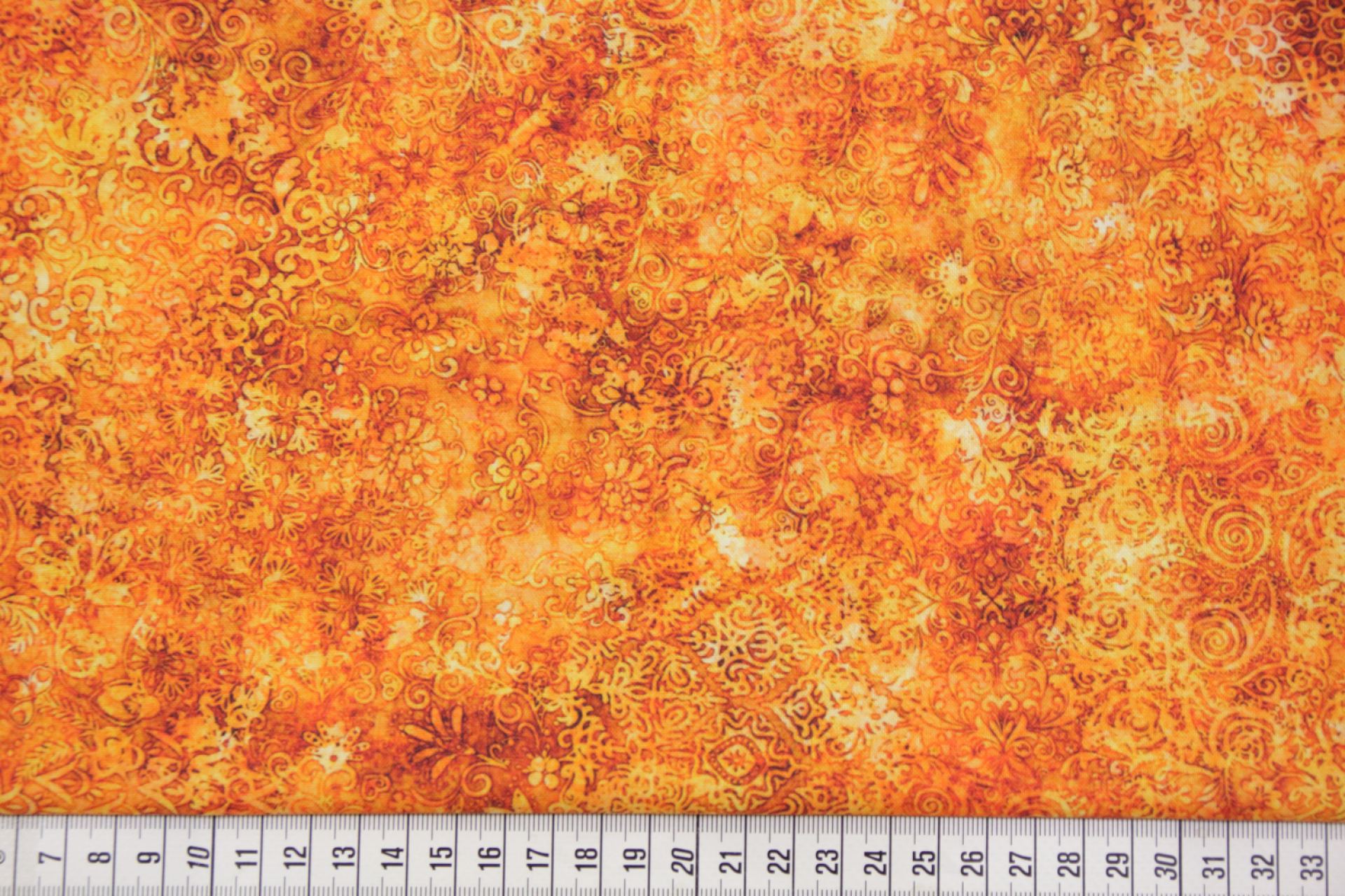 quiltstof-Oranje tinten met bloem-en bla