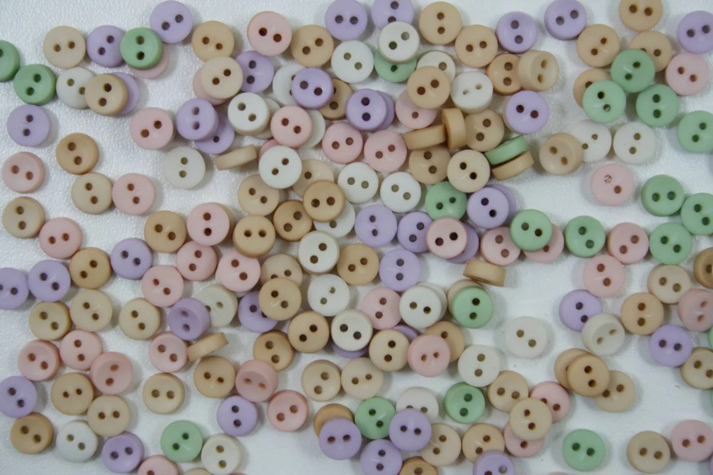 Mini sierknoopjes-rond-7 mm-pastel-Per 1.