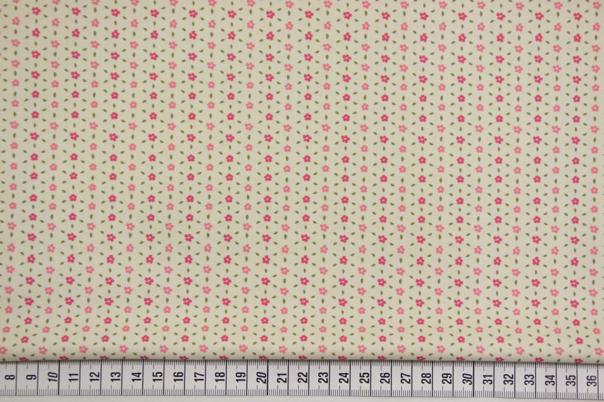 quiltstof-Ivoor met roze mini bloemetjes