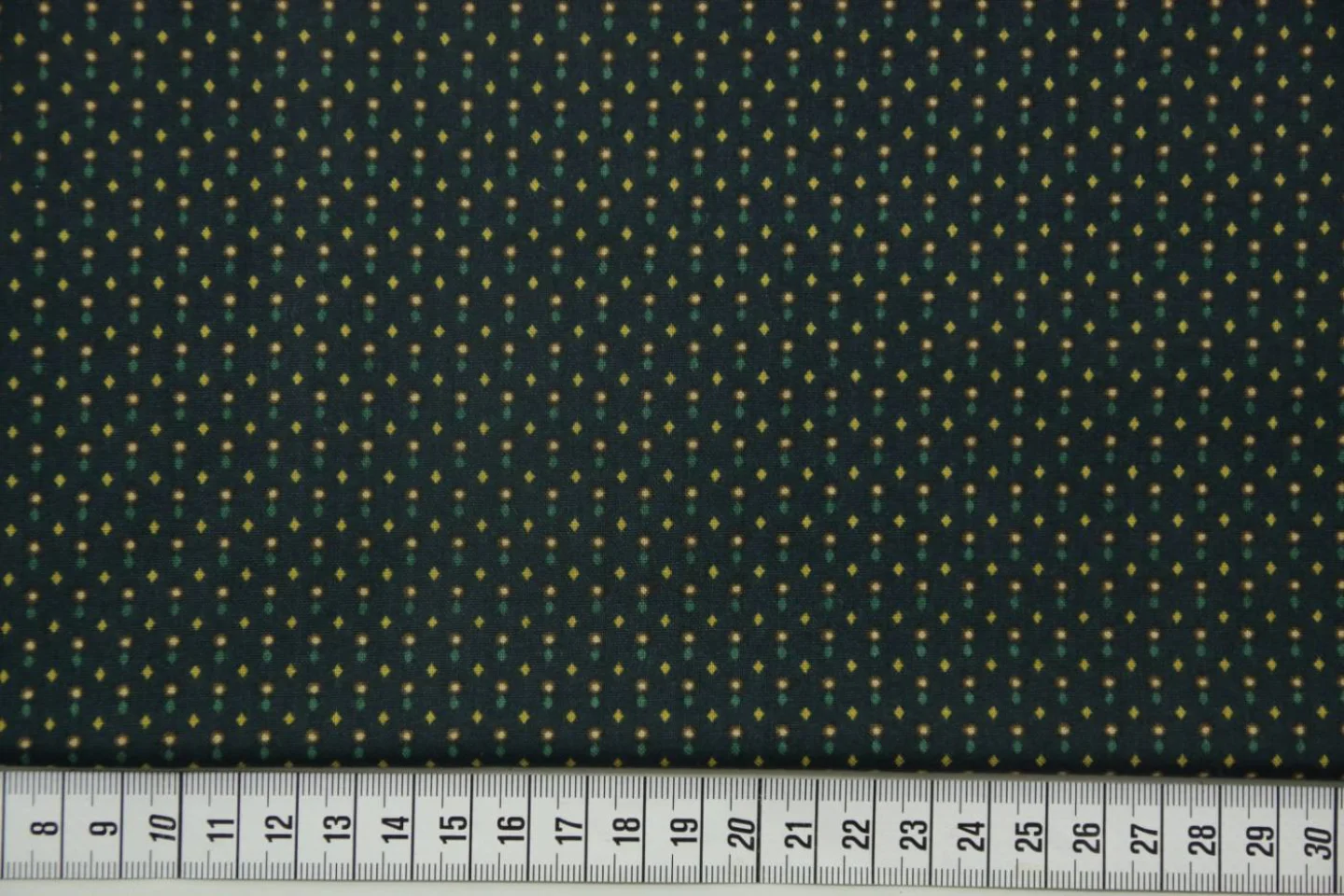 quiltstof-donkerblauw-gele en groene wyb.