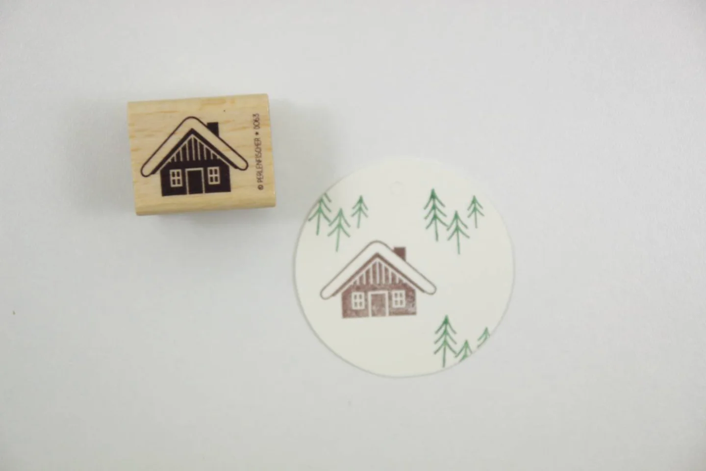 houten stempel hut perlenfischer 1.