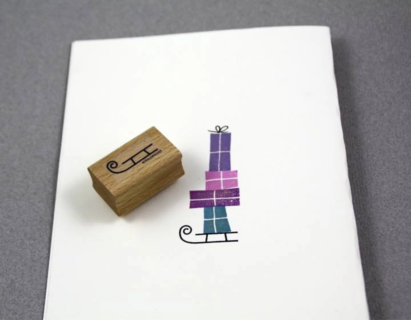 houten stempel slee perlenfischer 2.