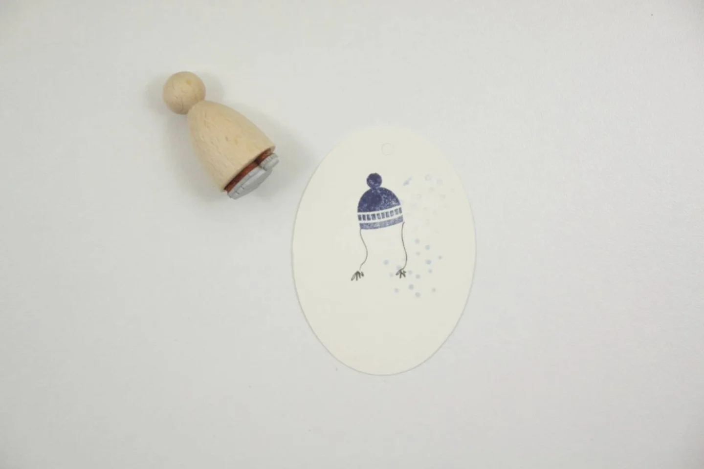 Houten stempel muts perlenfischer.