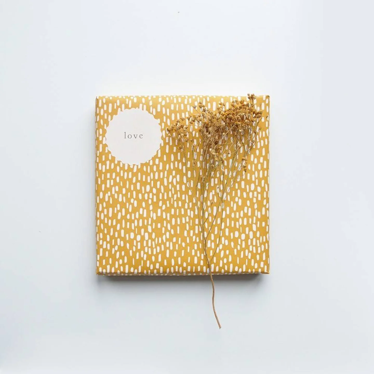 cadeaupapier okergeel hip grafisch yello.