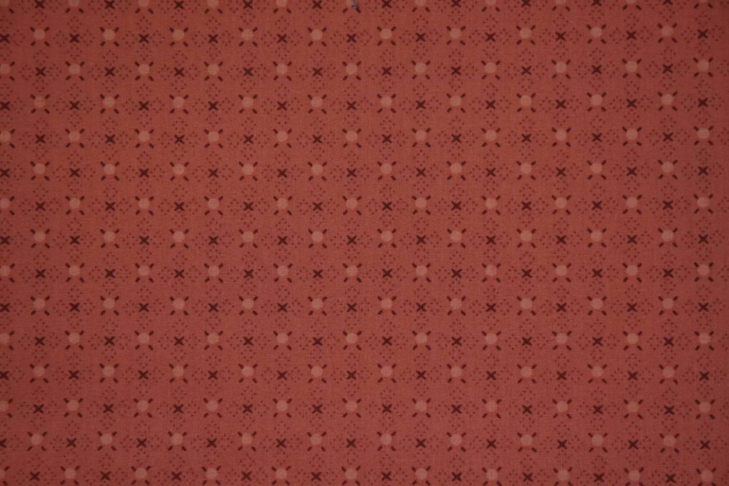 quiltstof-Donker zalmroze-schuine patroo.