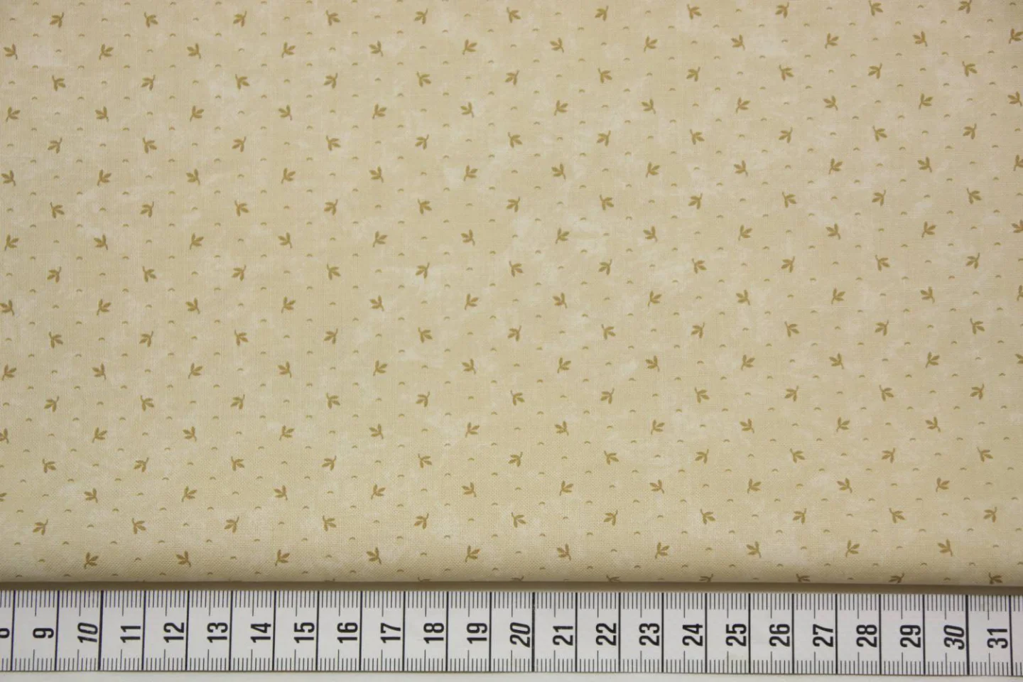 quiltstof-beige met bruin blaadje Moda-K.