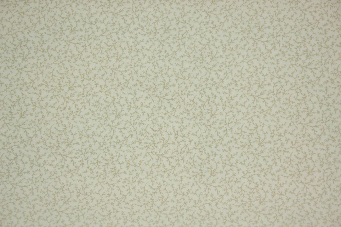 quiltstof-ivoor-slingertakjes in taupe-M.