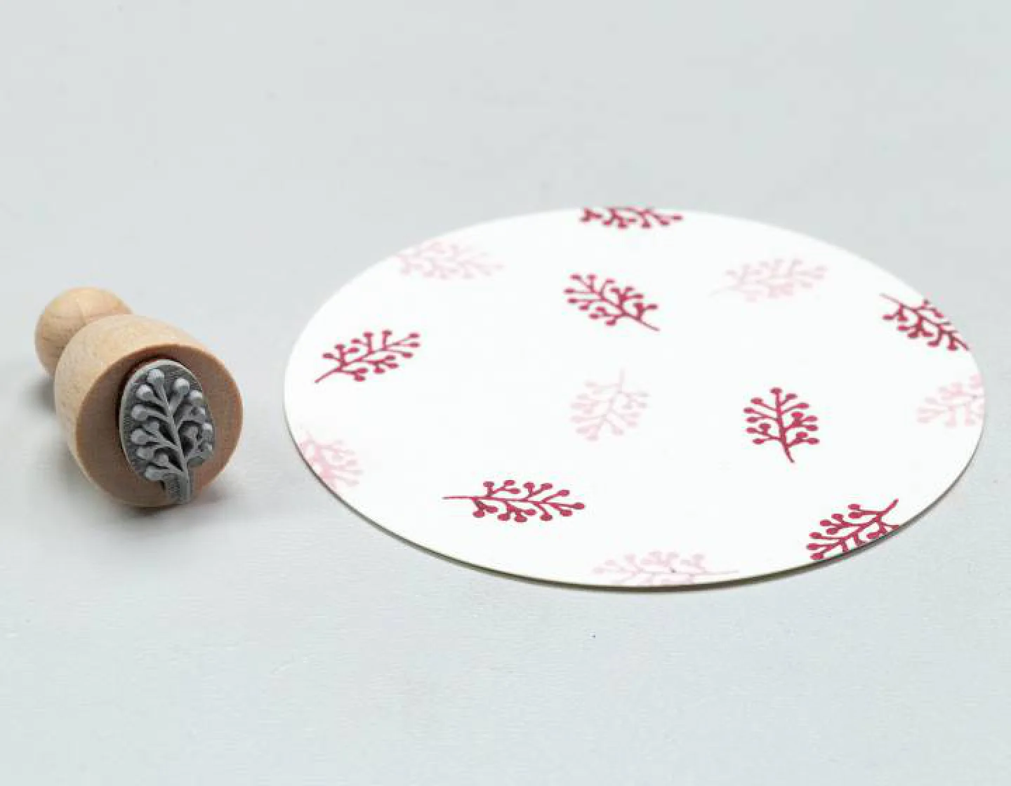 Houten stempel-Perlenfischer-knoppentwij.