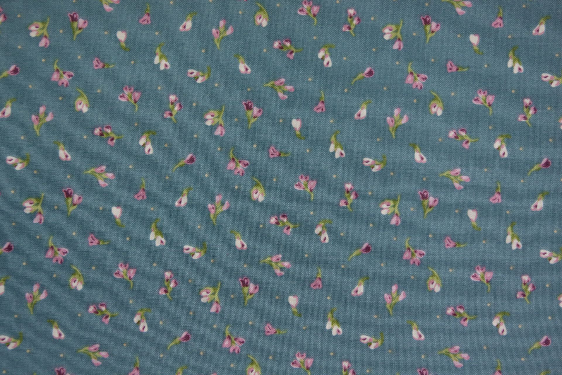 quiltstof-Petrolblauw met roze bloemetje