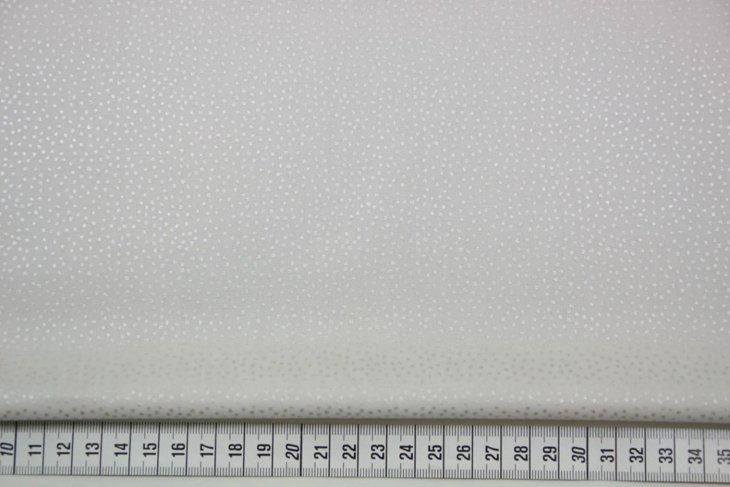 quiltstof-licht taupe-zacht glanzend sti.