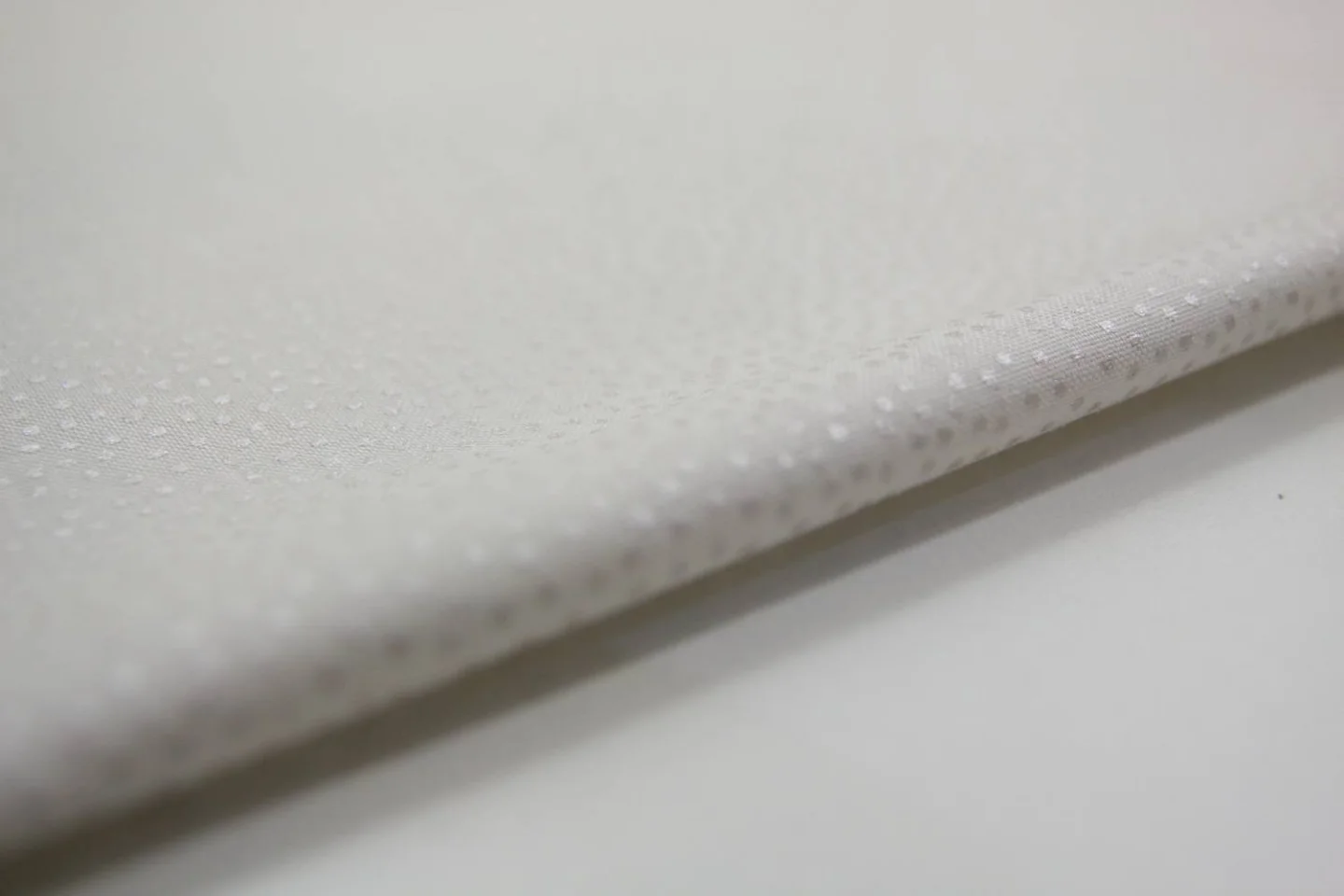 quiltstof-licht taupe-zacht glanzend sti.