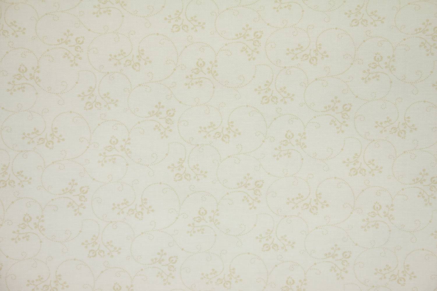 quiltstof-ivoor met,beige gestippelde ta