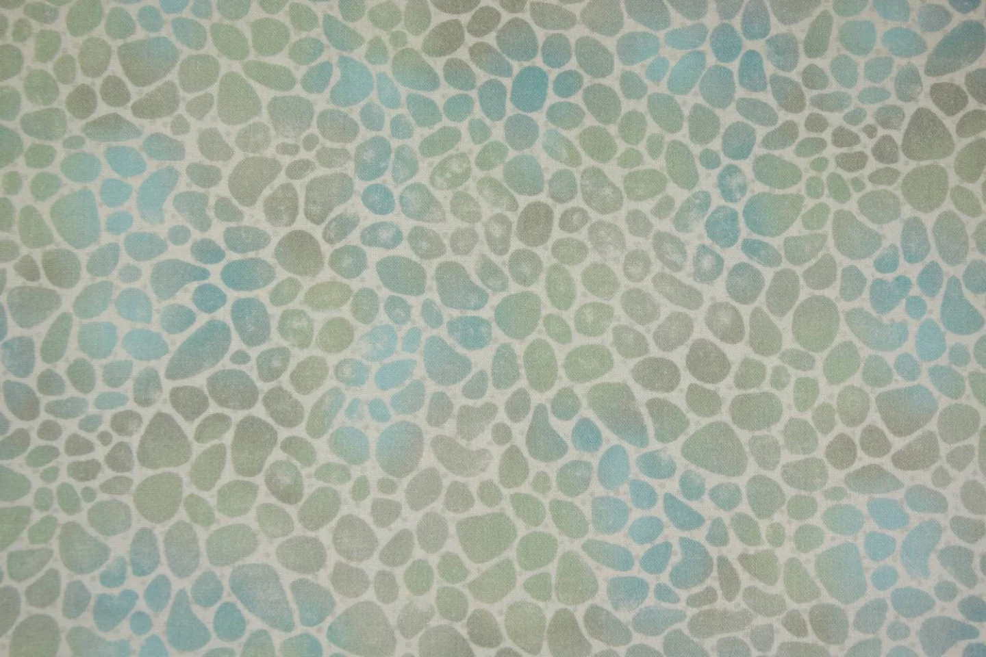 quiltstof-ecru met blauwe en groene kiez.