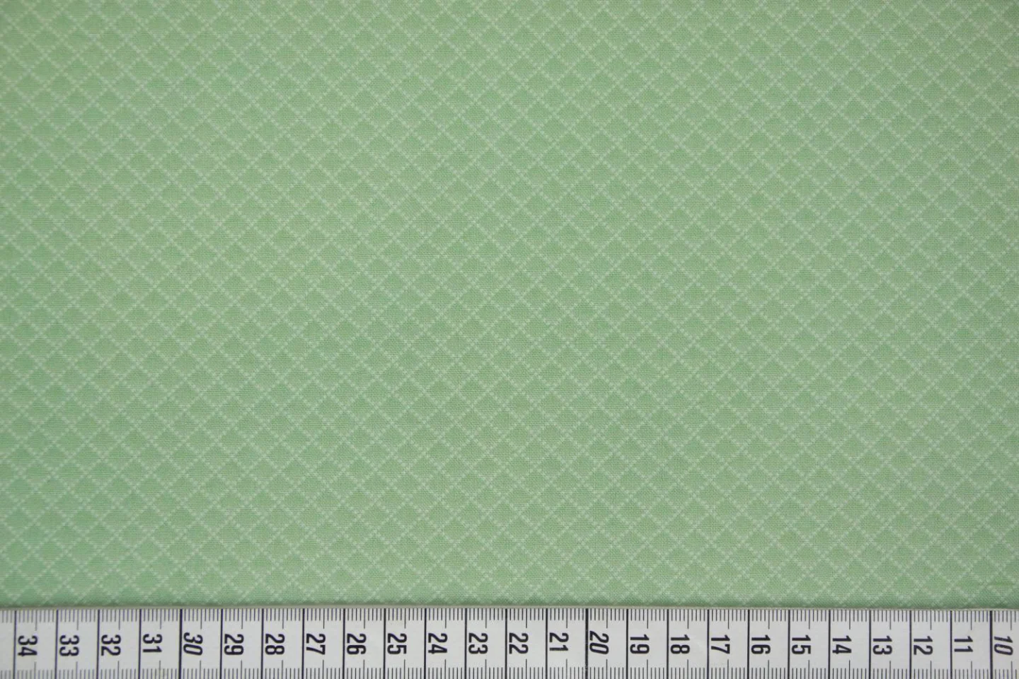 quiltstof-mintgroen met schuin ruitje-An.