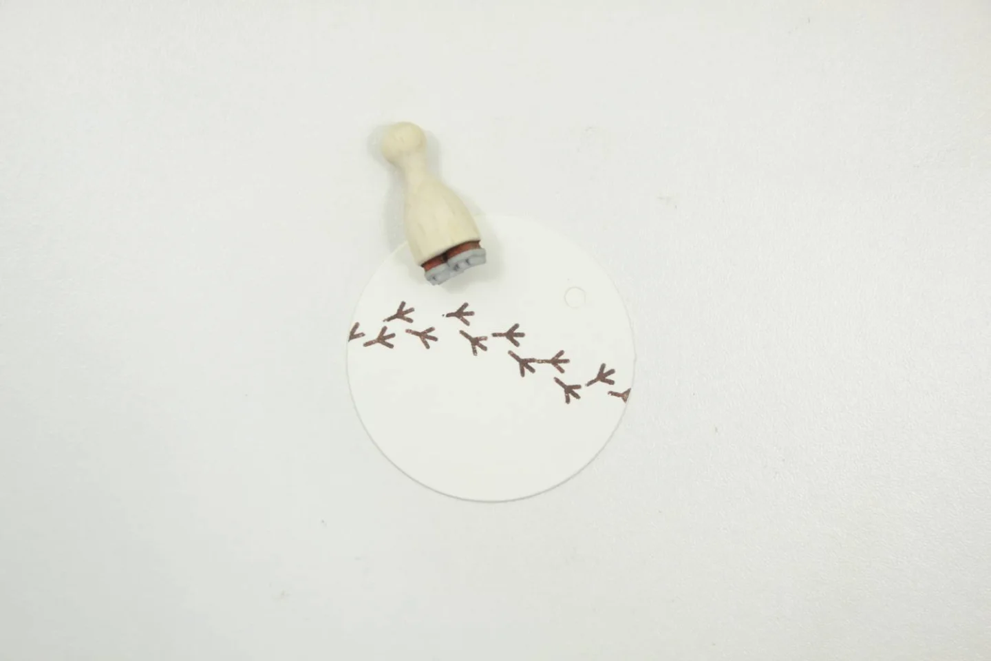 Houten stempel-Perlenfischer-vogelspoor-.