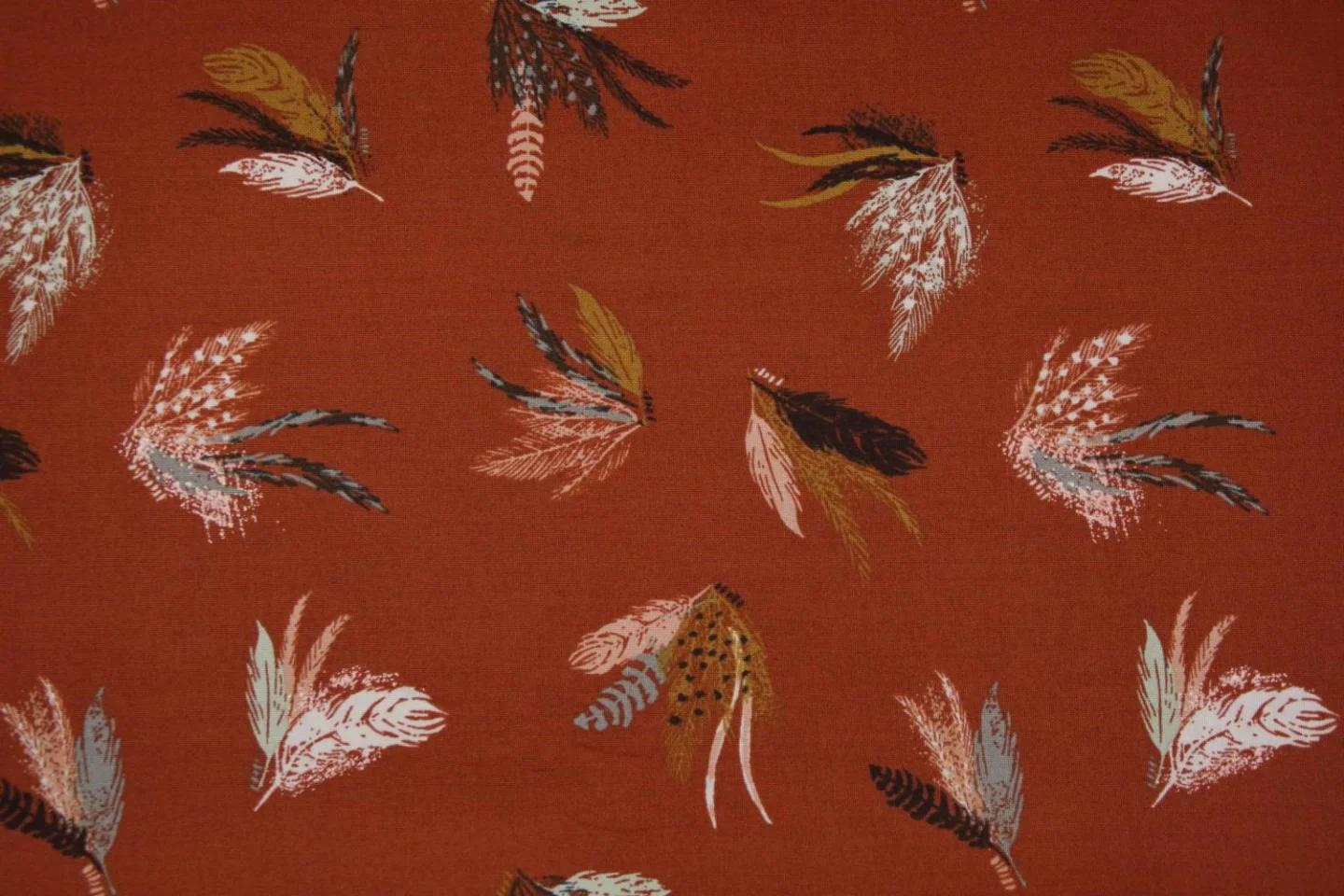 quiltstof aangepast-Warm oranje met vere.