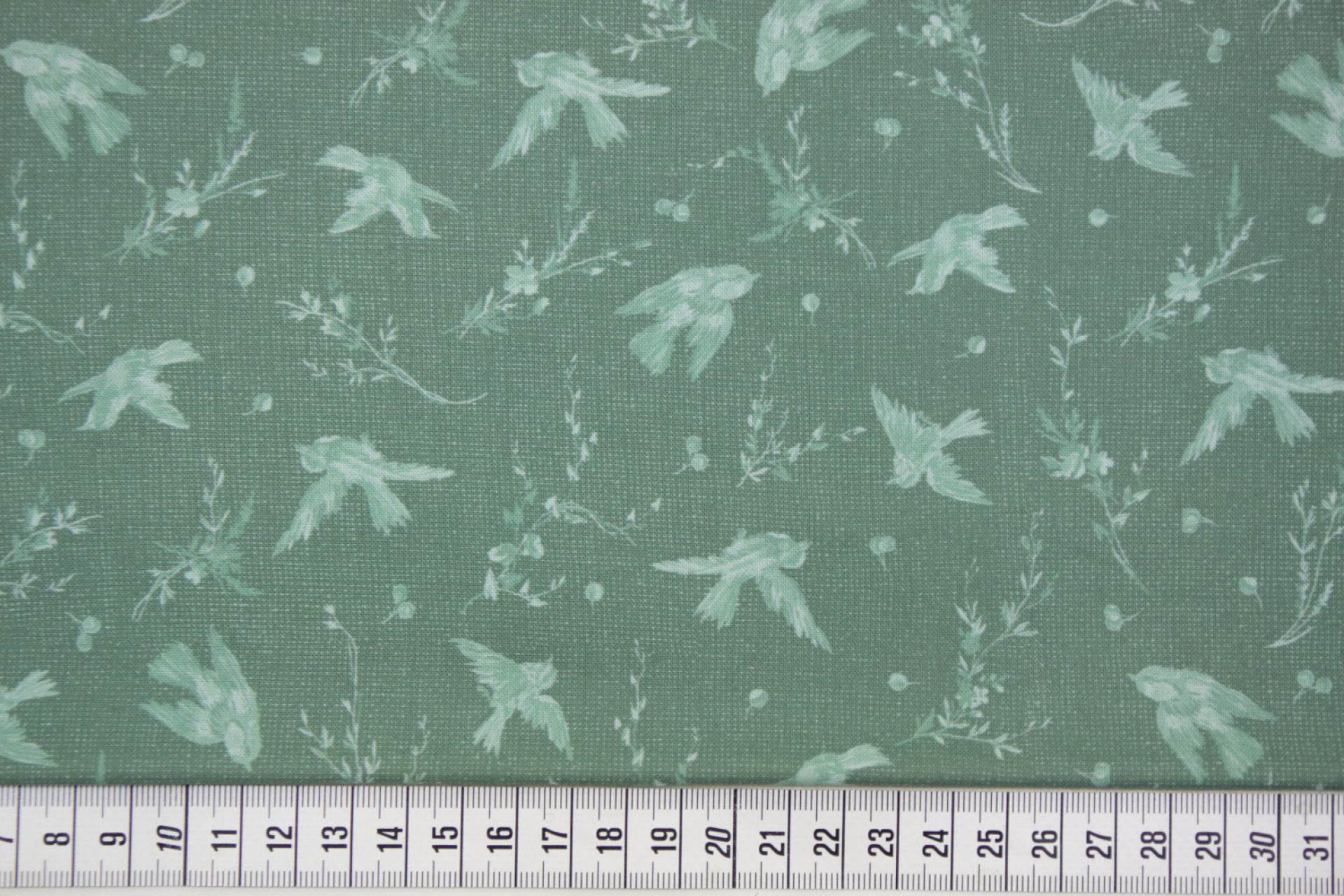 quiltstof-Donkergroen met vogeltjes in g