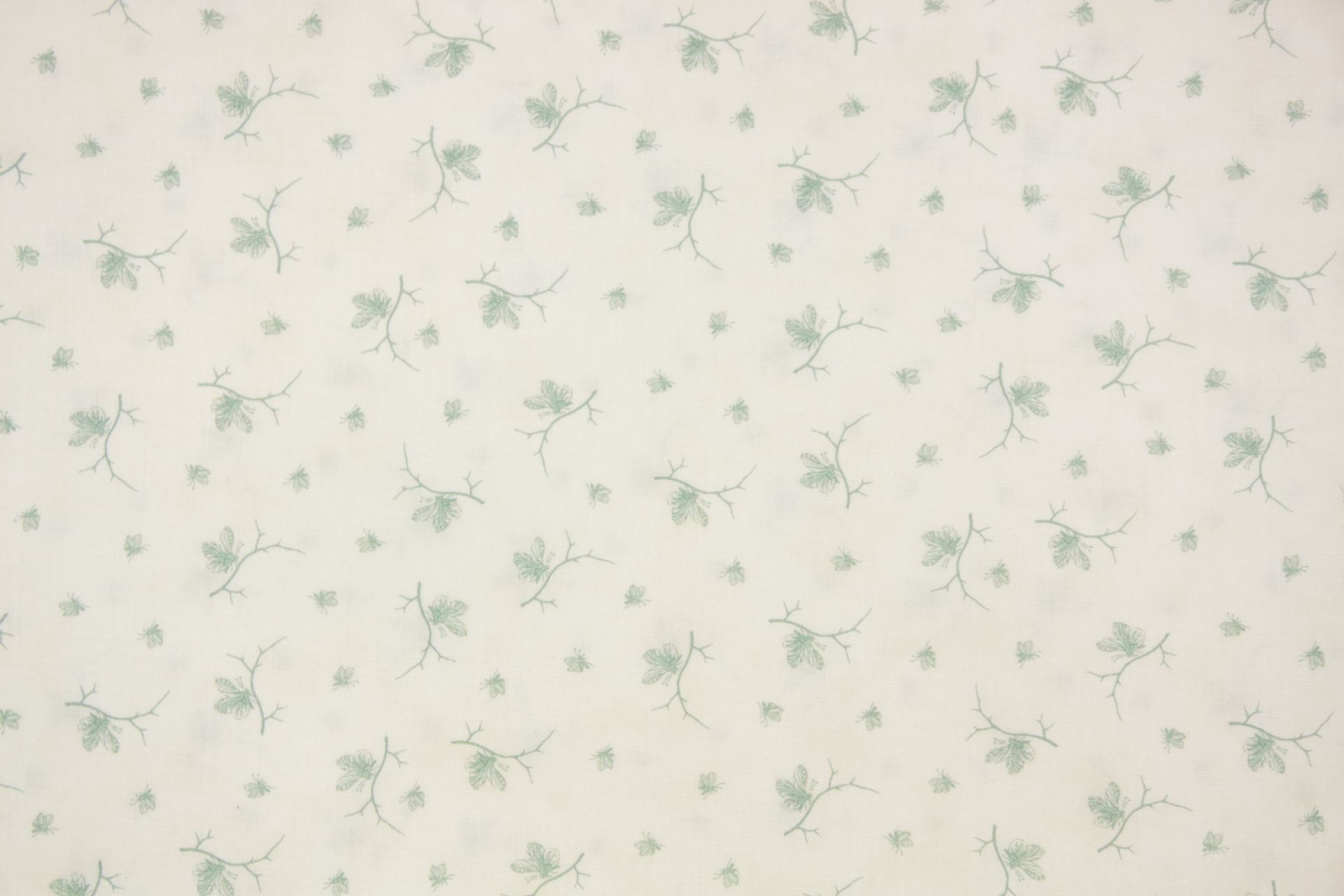quiltstof-Roomwit met zeegroen vlindertj