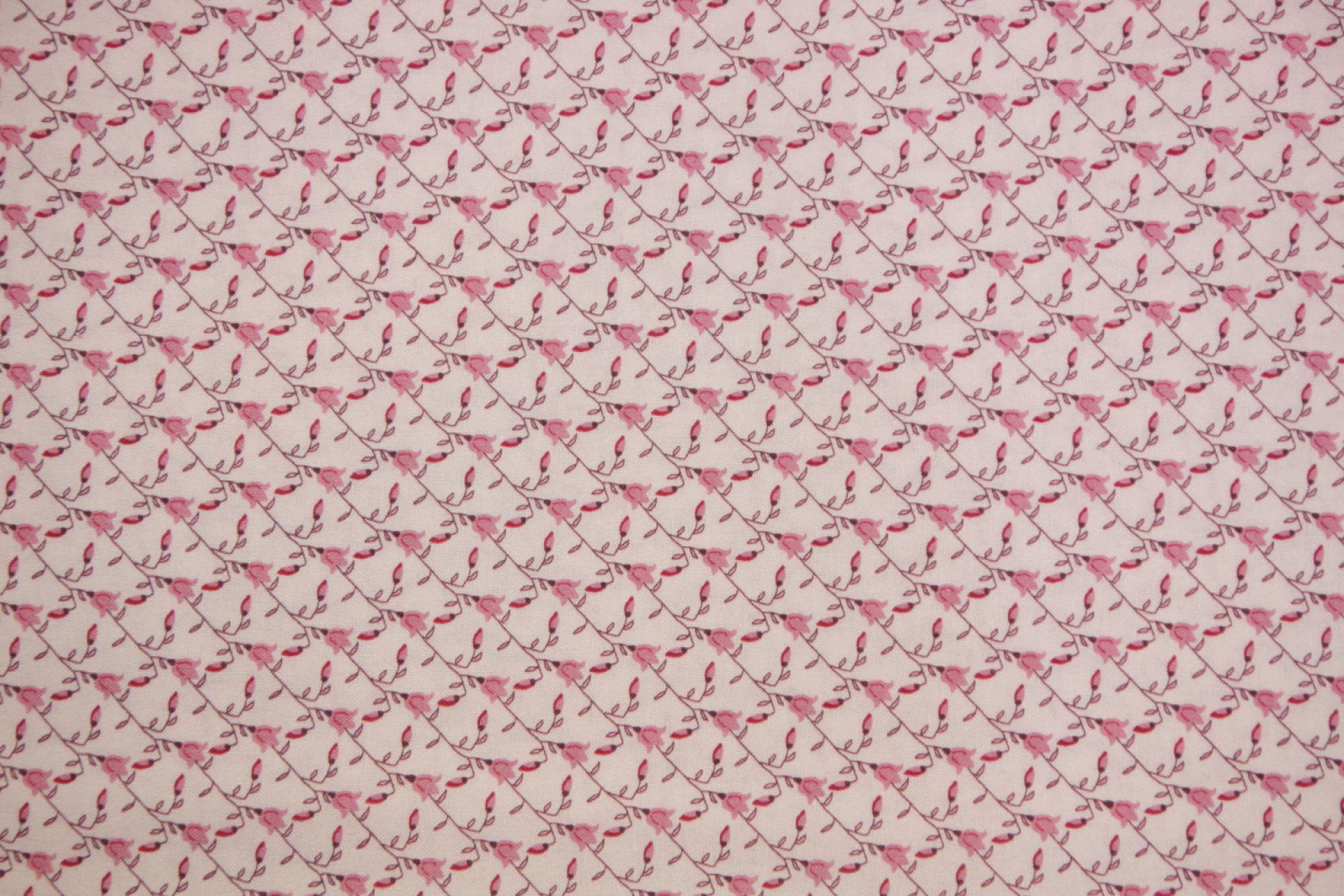 quiltstof-Zachtroze met oudroze bloemetj