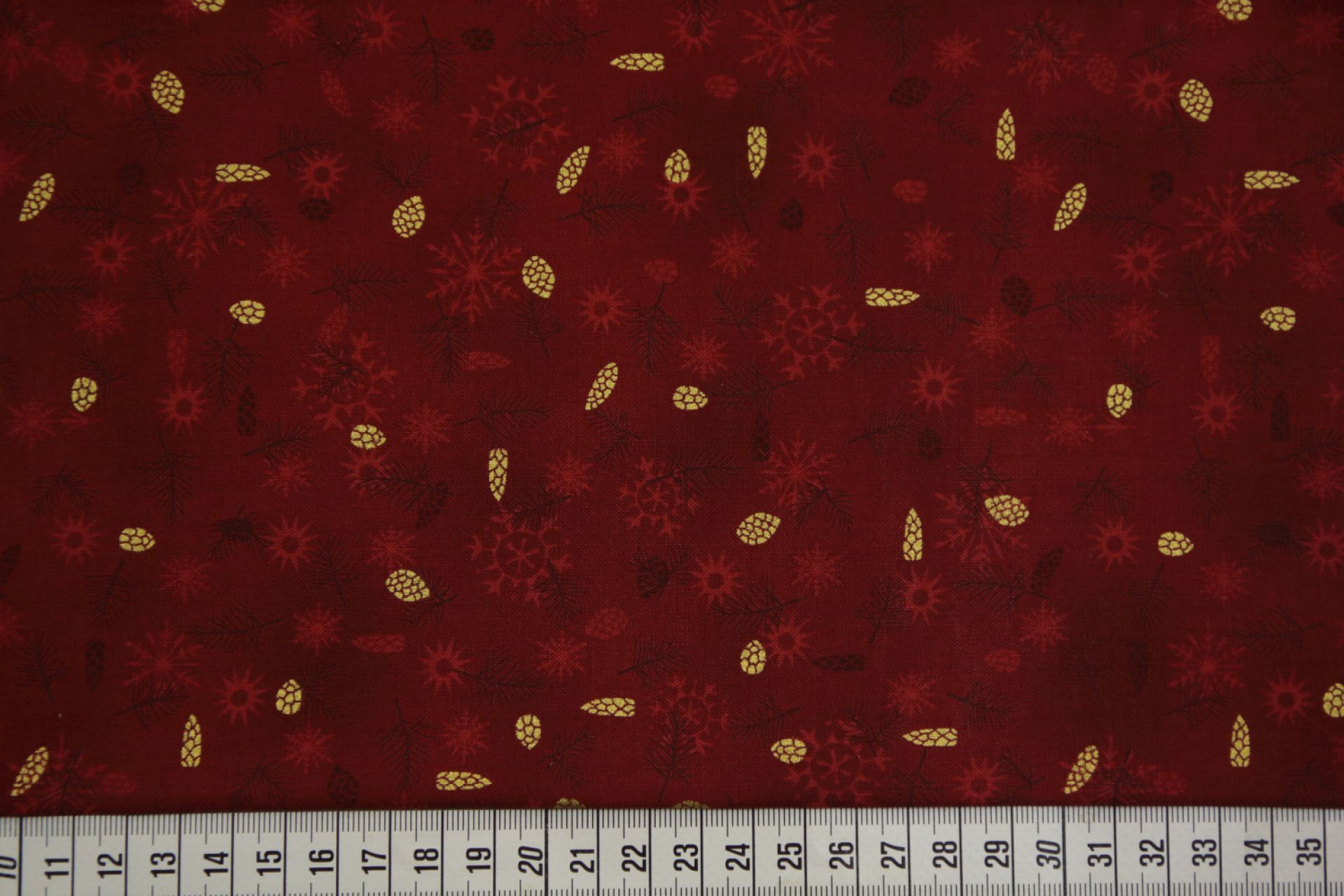 quiltstof-Donkerrood met dennenkegels in