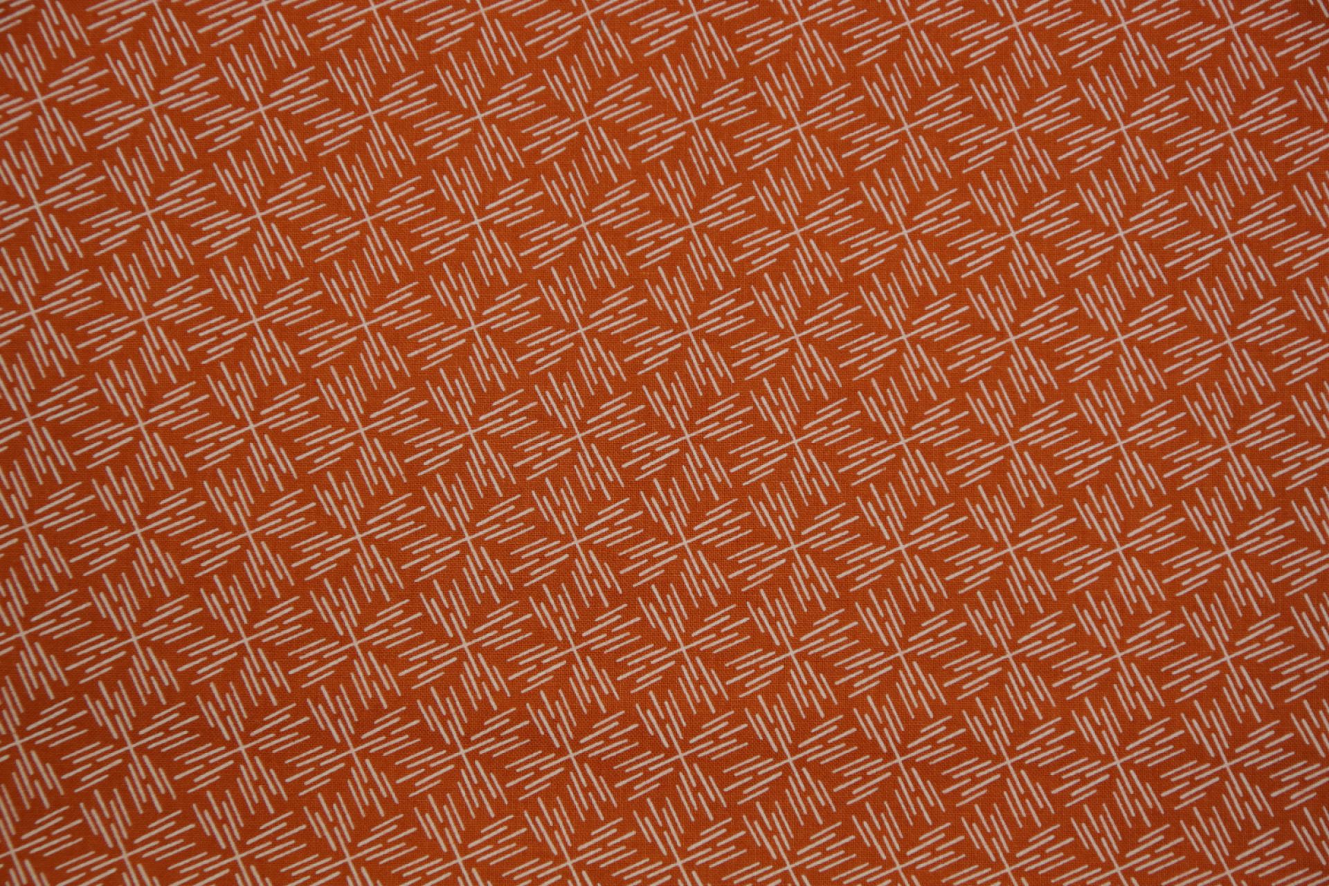 quiltstof-Warm oranje met streepjesmotie