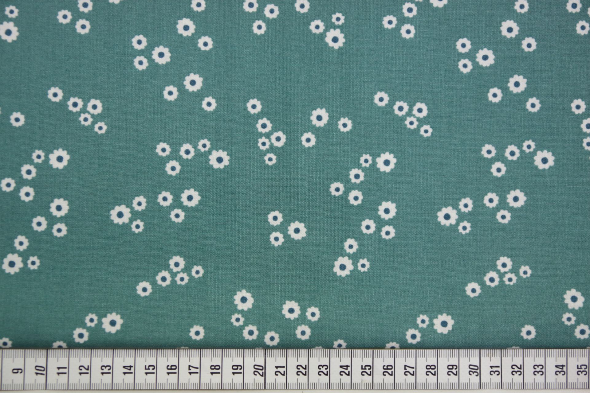 quiltstof-Petrol met witte bloemetjes-Mo