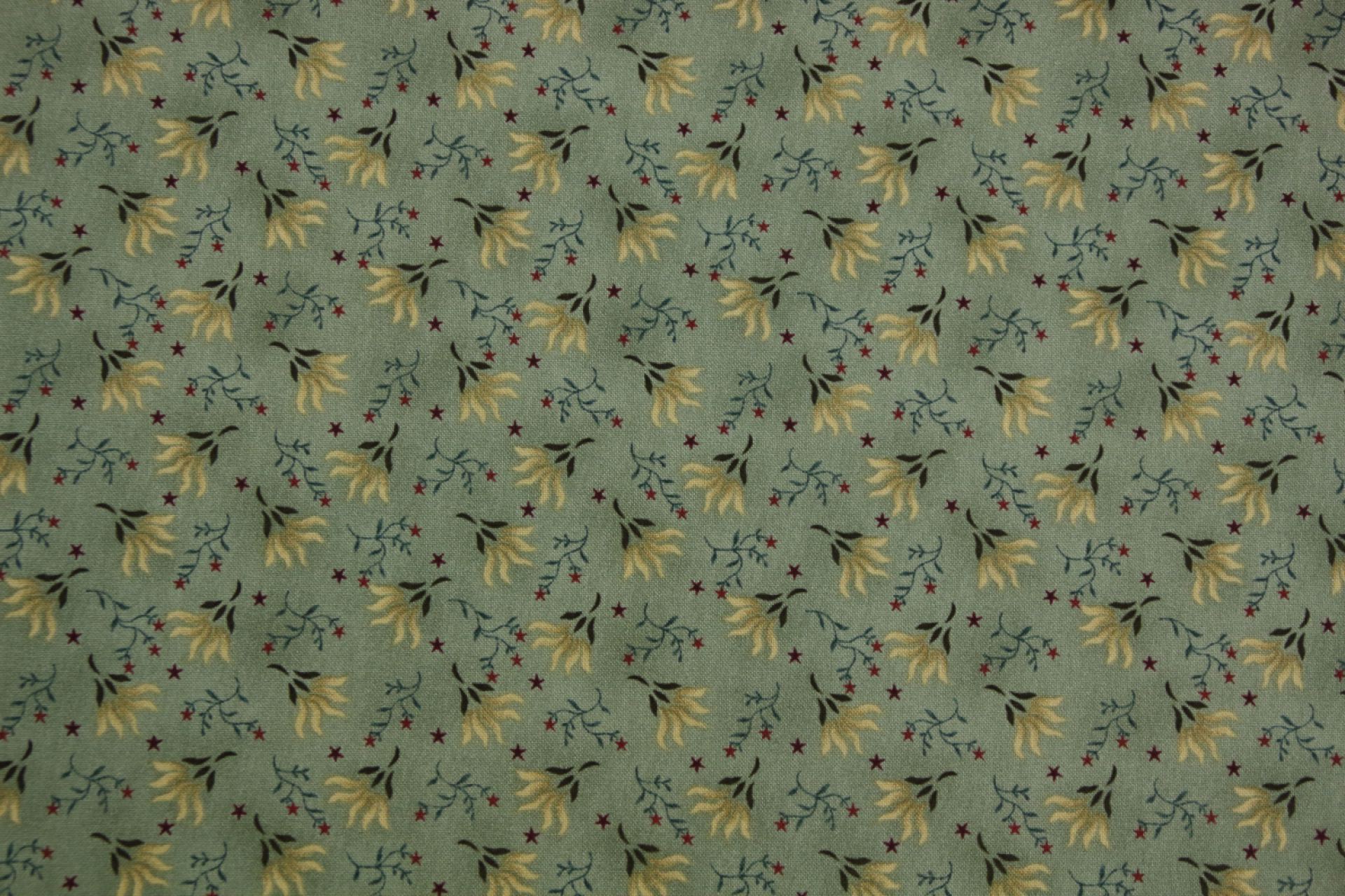 quiltstof-Grijsgroen met zandkleurige bl