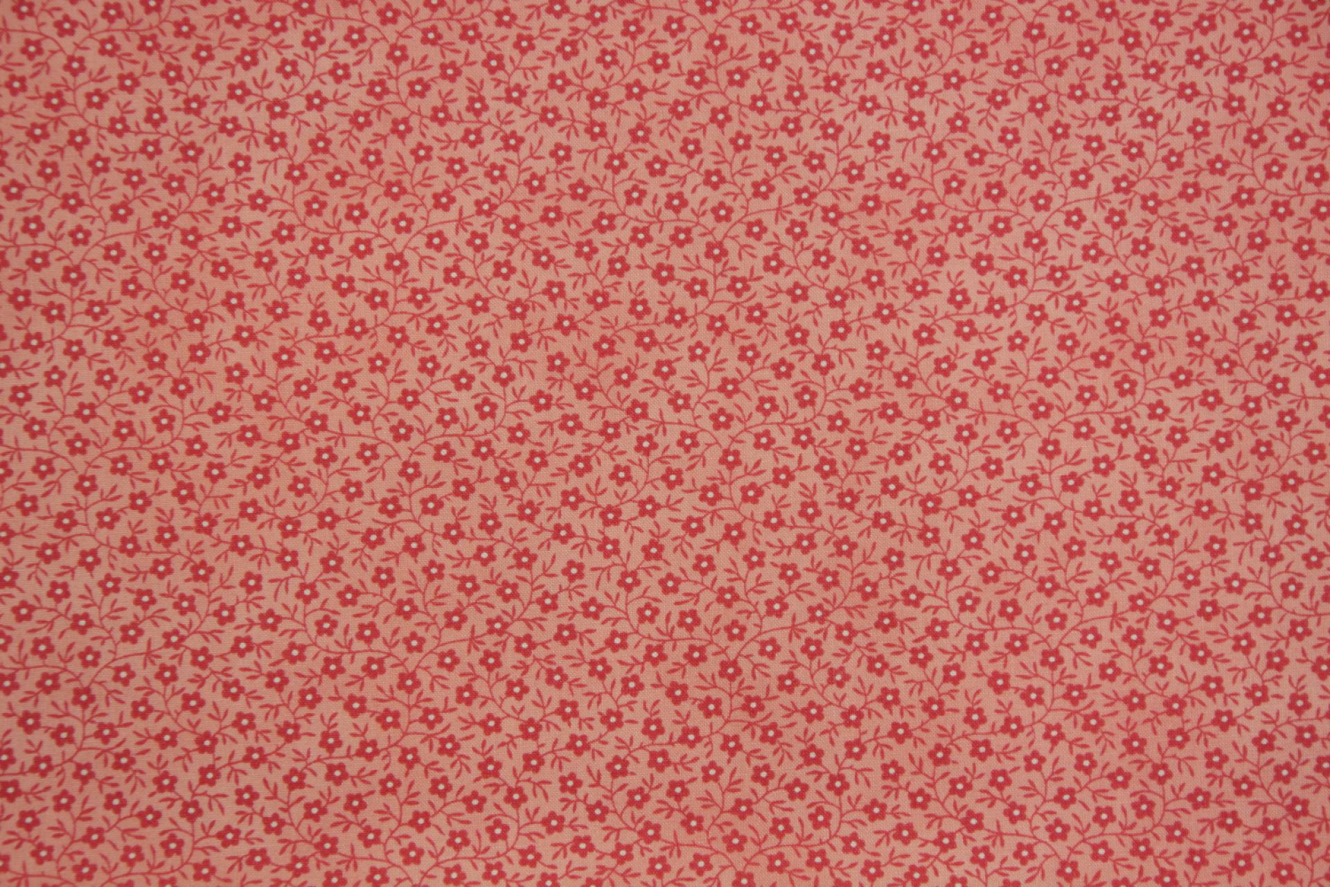 quiltstof-Zalmroze met rozerood bloemetj