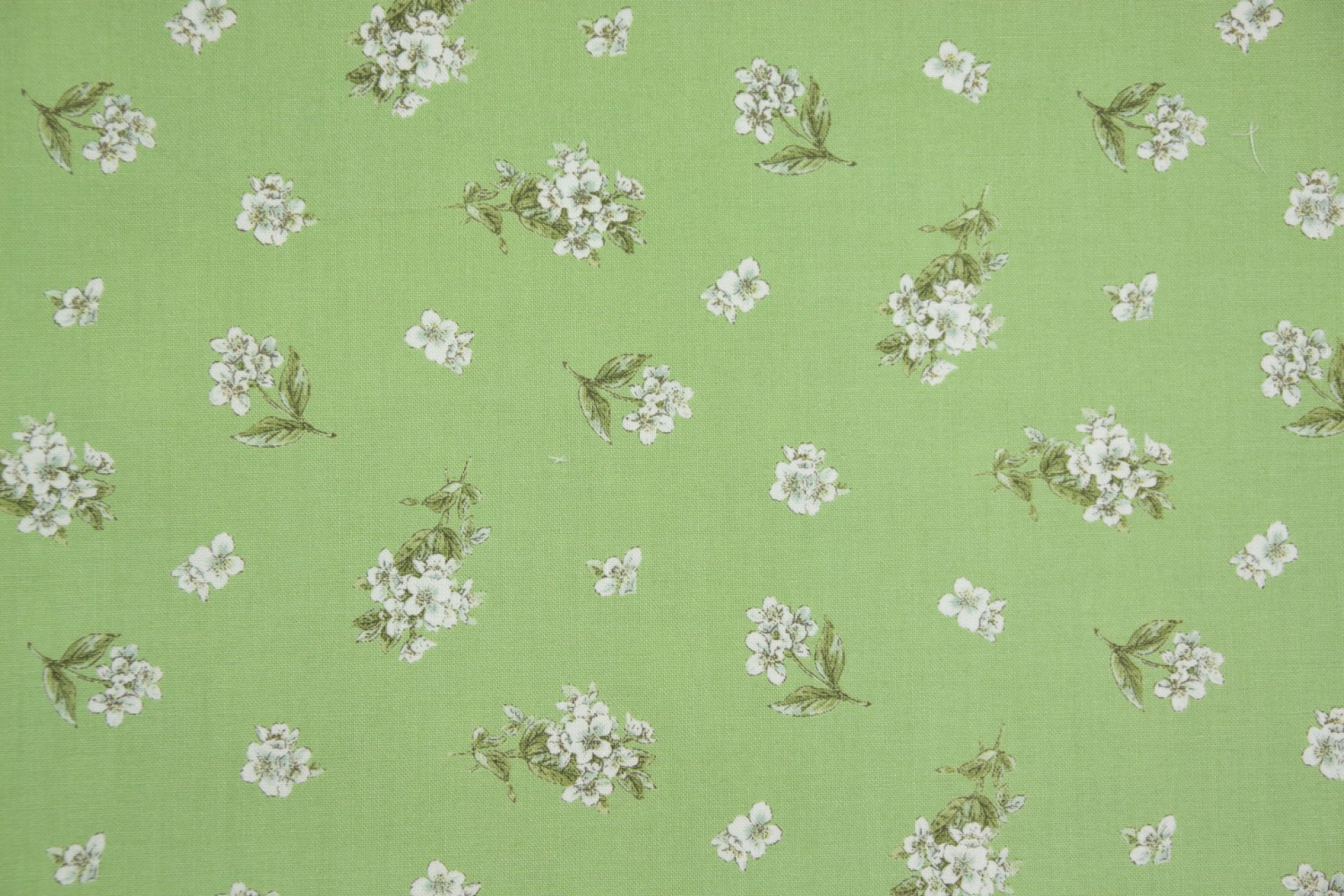 quiltstof-Varengroen met witte boeketjes