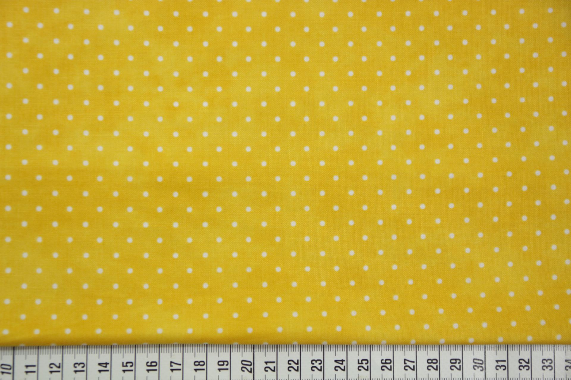 quiltstof-Warm geel met witte stipjes-Ma