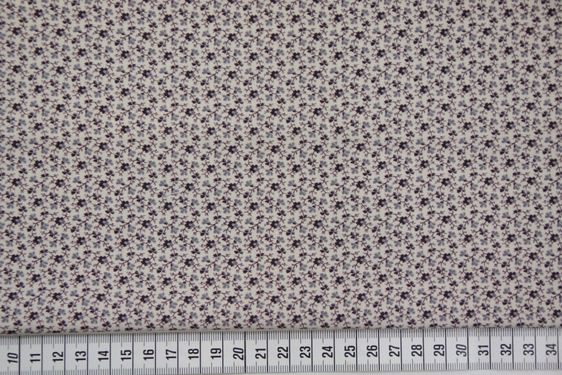 quiltstof-Ivoor met paarse bloempjes-Mar