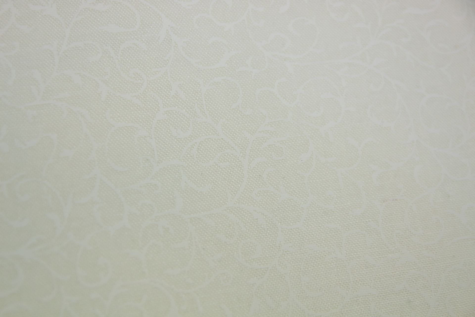 quiltstof-Ivoor met slingerende takken-