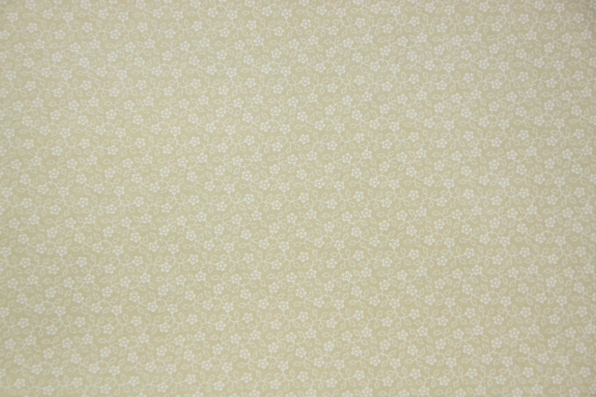 quiltstof-Beige met bloemtakje in ivoor-