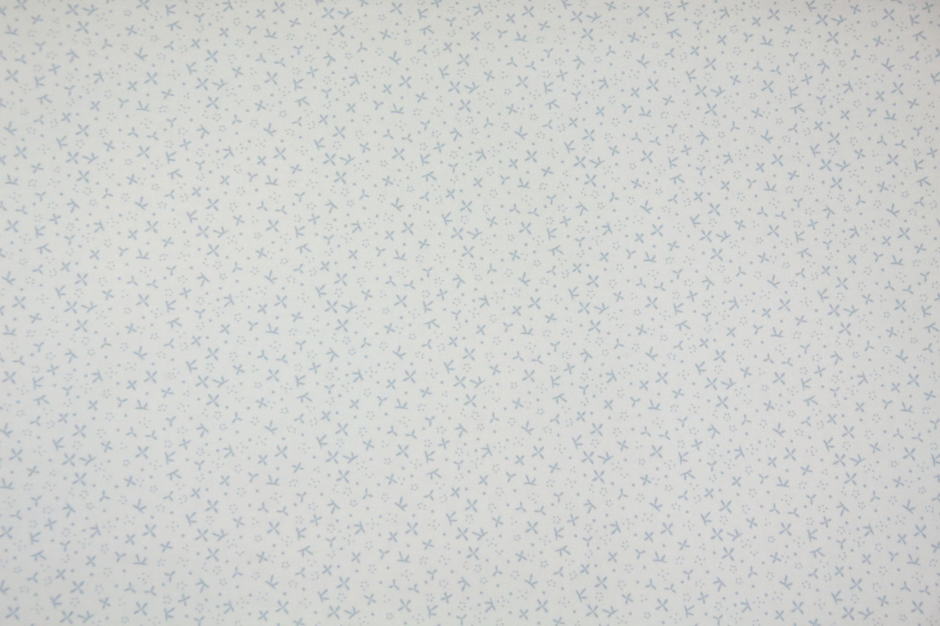 quiltstof-Ivoor met oudblauwe motiefjes-