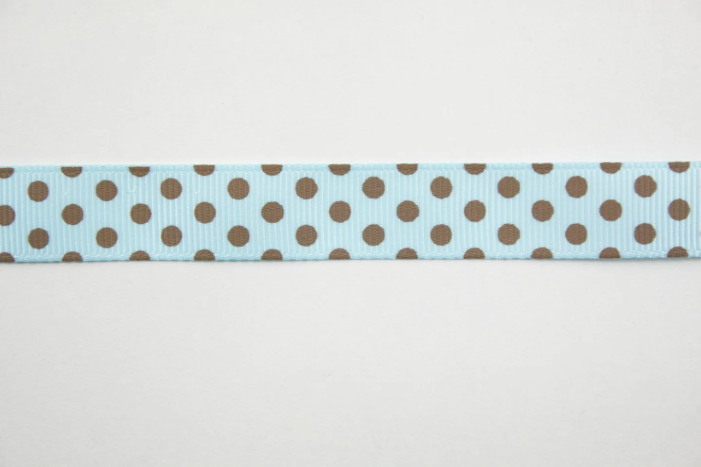 Lint-babyblauw-bruin stipje.