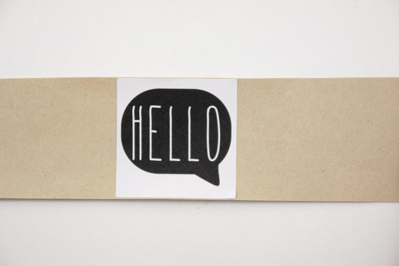 Sluitsticker-tekstballon hello-zwart-a