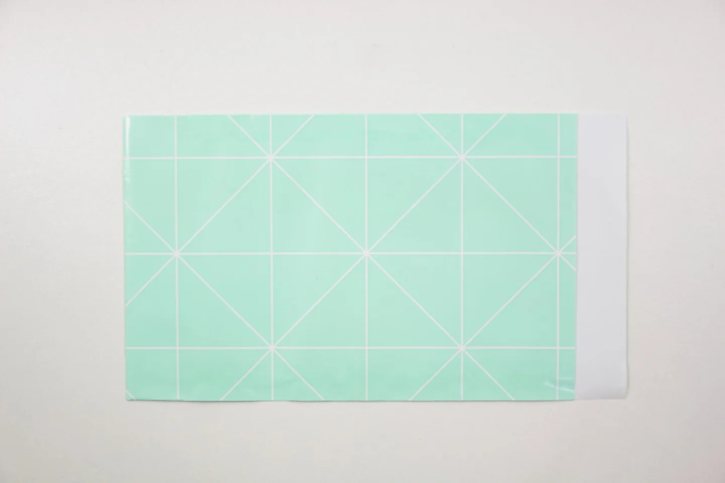 Zakje-papier-mintgroen- wit grafisch pat.
